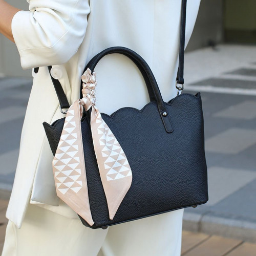 Leather Bag With Wavy Edge Design